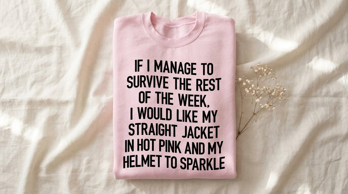 Folded light pink Straight Jacket In Hot Pink sweatshirt on rumpled ivory linen with baby's breath sprig – Peachy Sunday Journal featured hero