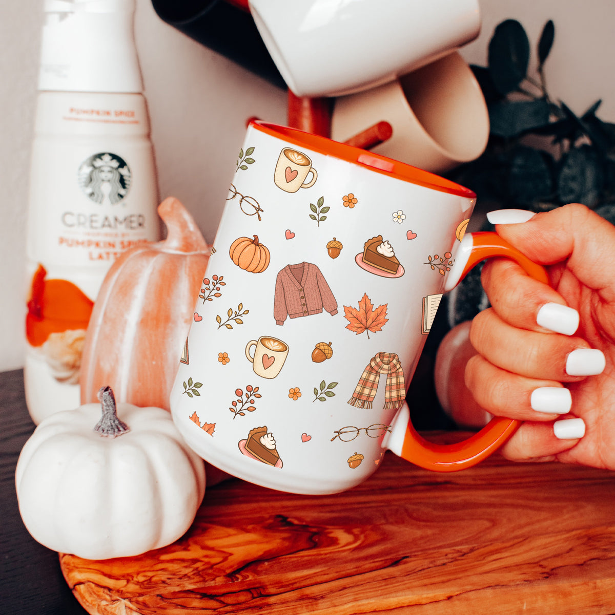 Fall sweater and pumpkin latte tea cup in orange trim