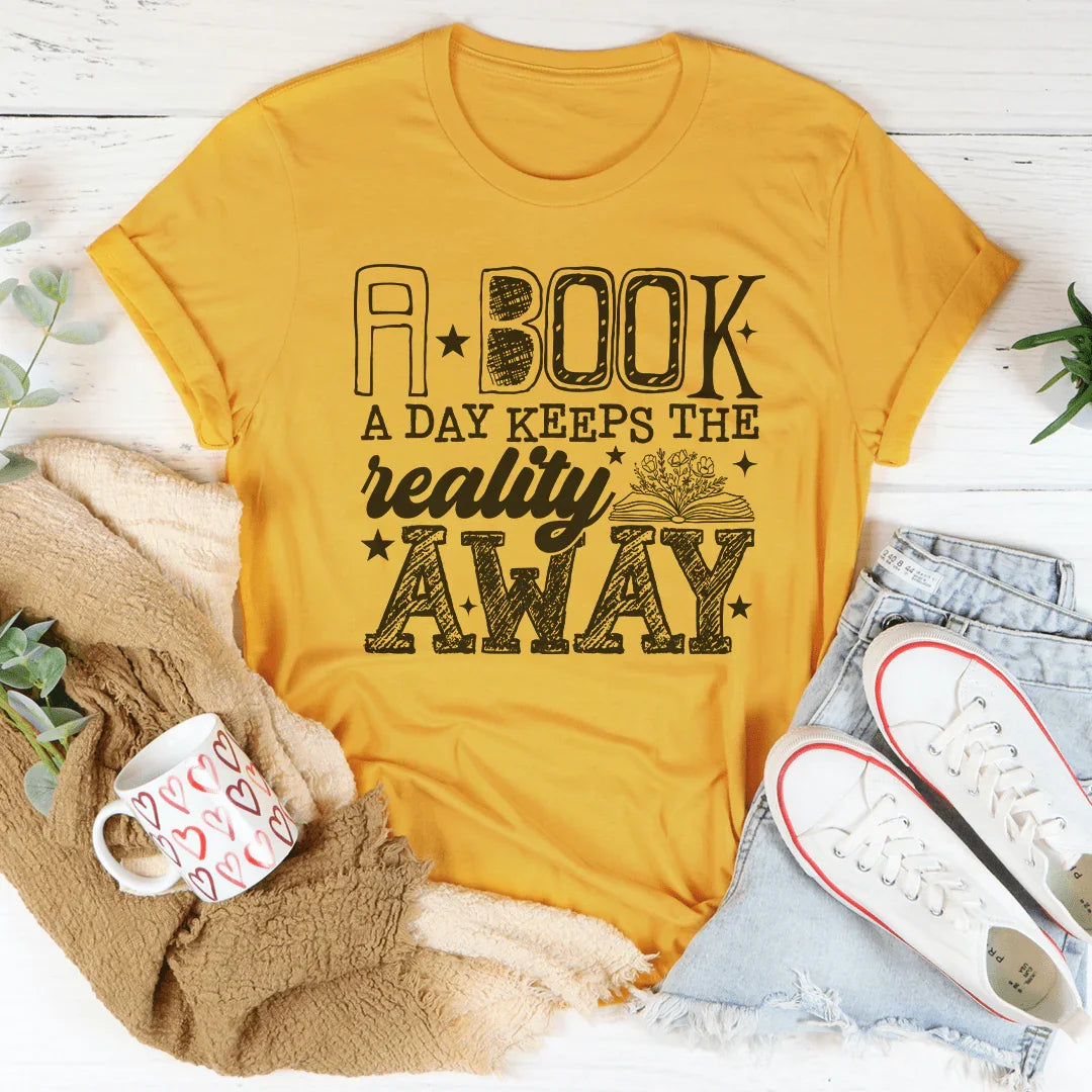 A Boook A Day Keeps The Reality Away Tee Mustard / S Peachy Sunday T-Shirt