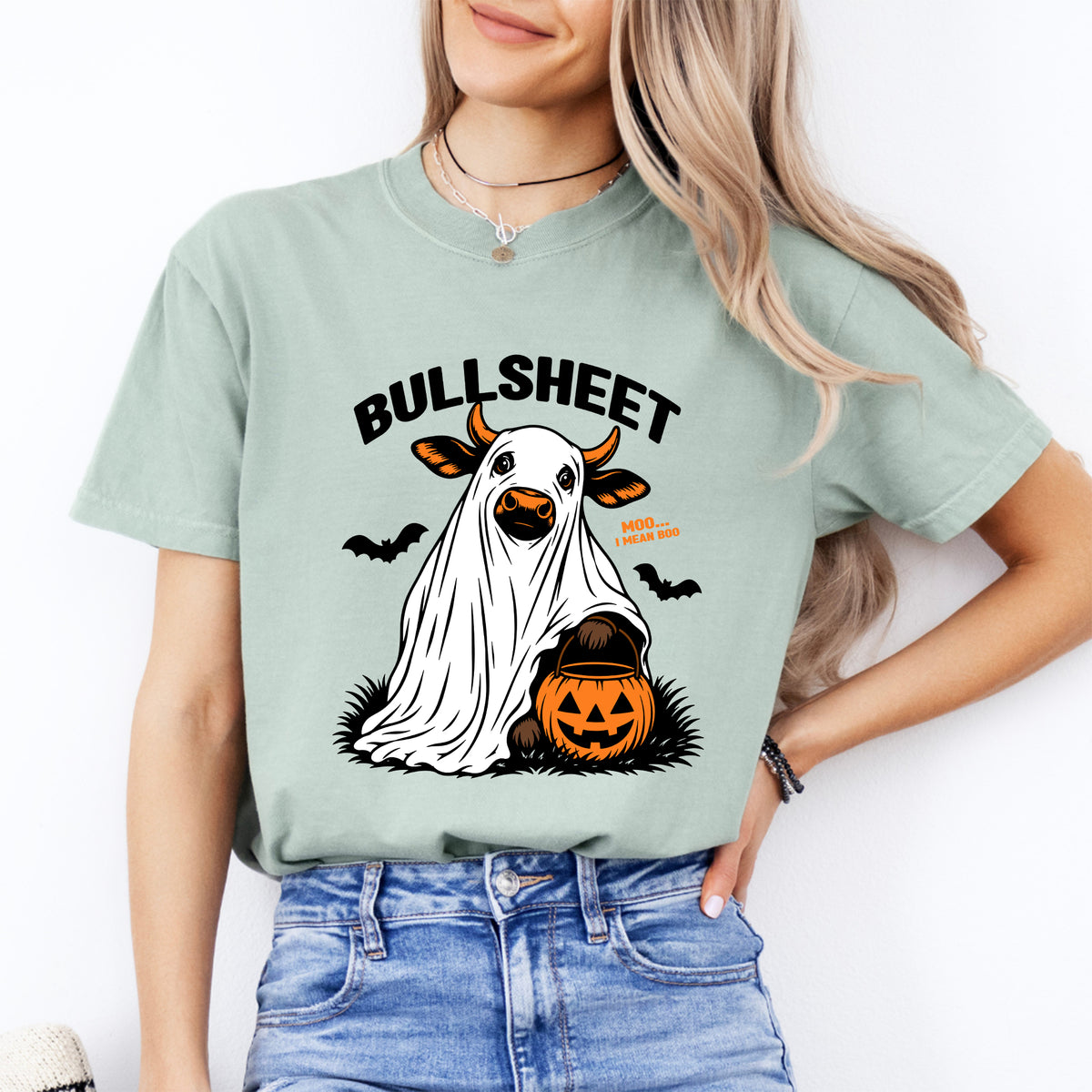 Bullsheet funny cow ghost graphic tee with jack-o-lantern candy bucket in bay green