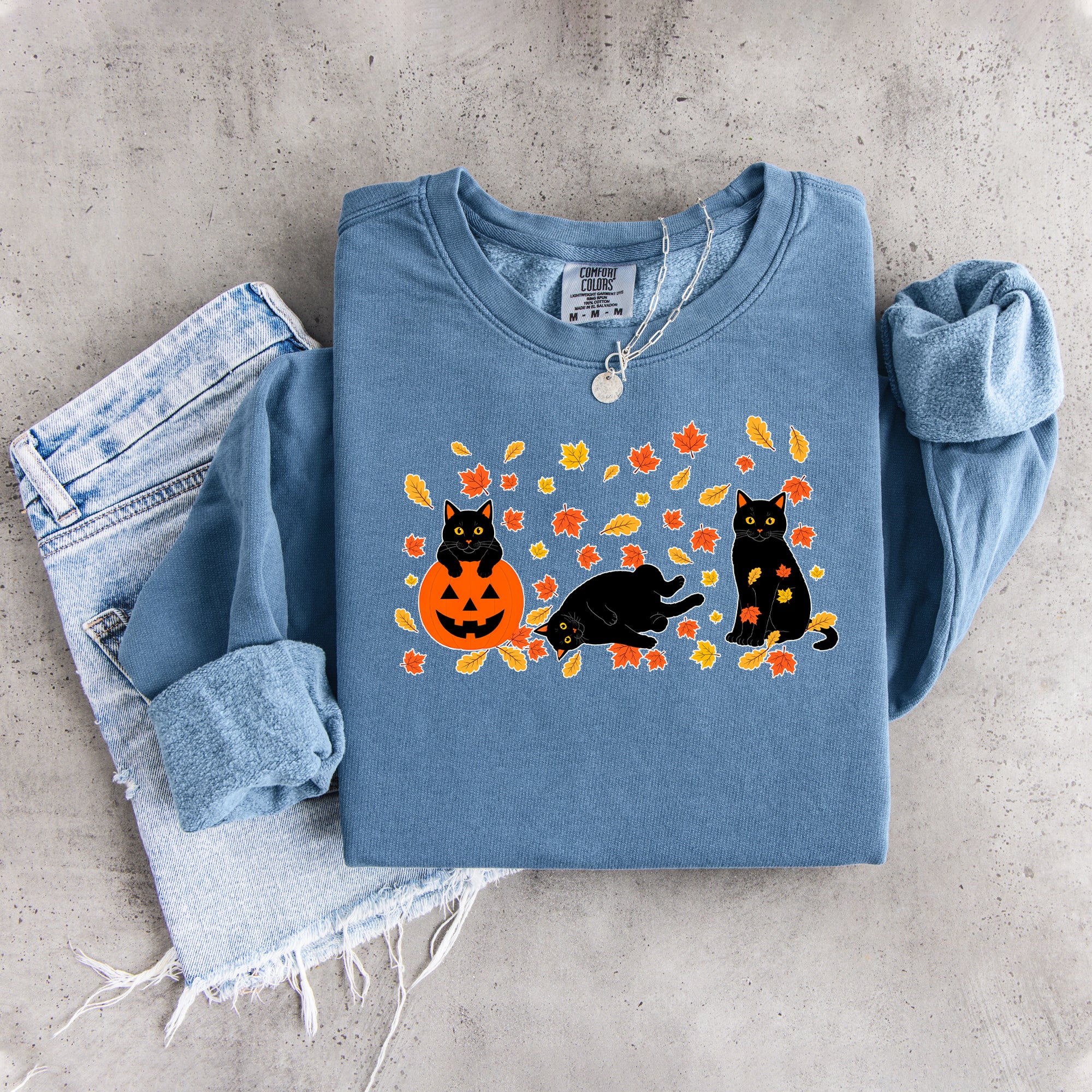 Schwarzes Herbst-Sweatshirt mit schwarzer Katze