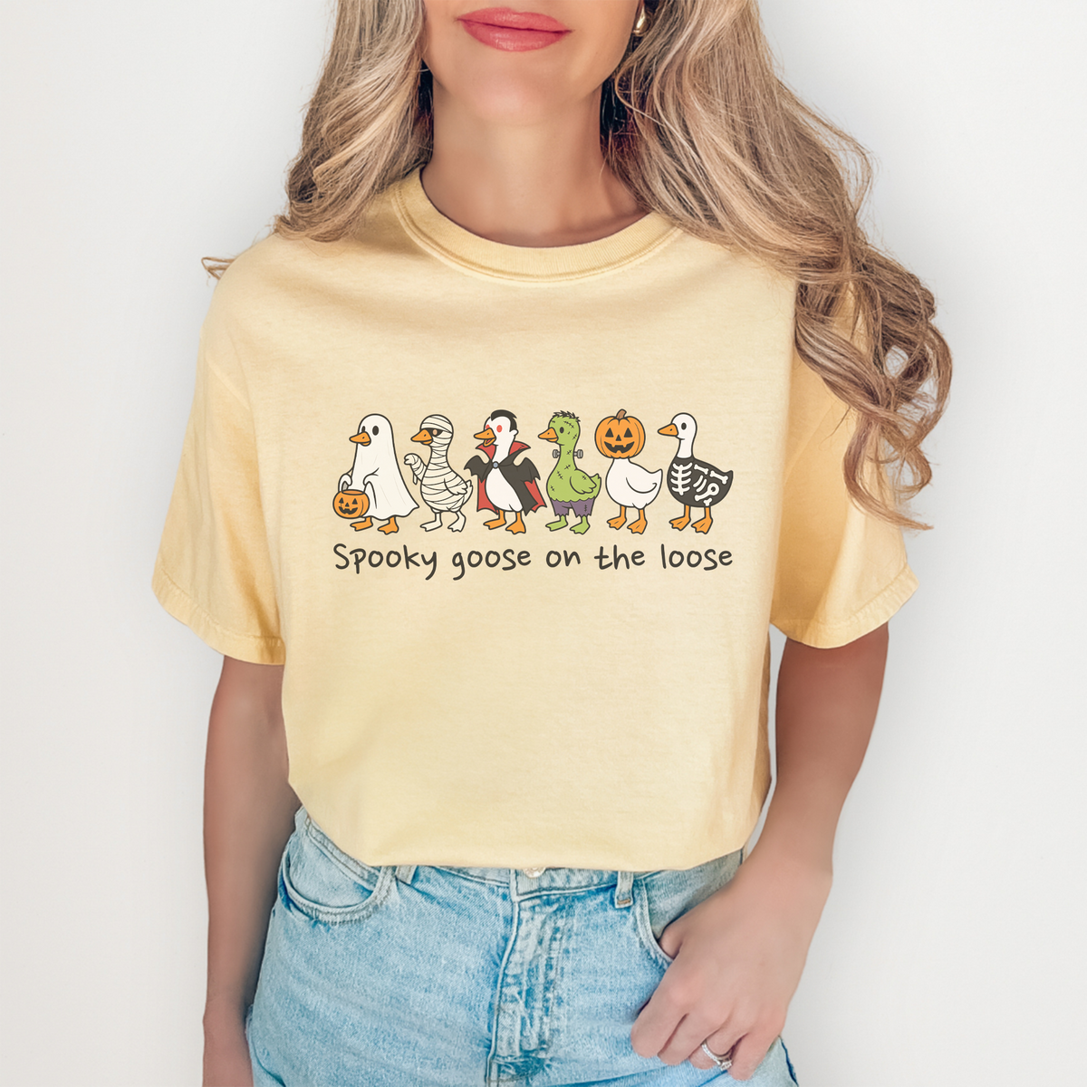 Spooky Goose On The Loose Halloween graphic t-shirt in butter yellow