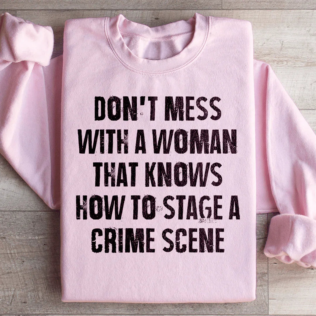 Don't Mess With A Woman That Knows How To Stage A Crime Scene Sweatshirt Light Pink / S Peachy Sunday T-Shirt