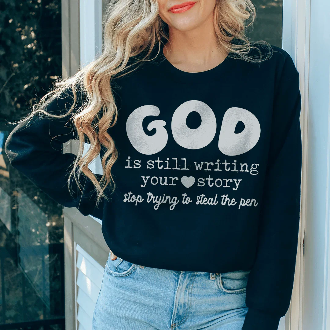God Is Still Writing Your Story Stop Trying To Steal The Pen Sweatshirt Black / S Peachy Sunday T-Shirt