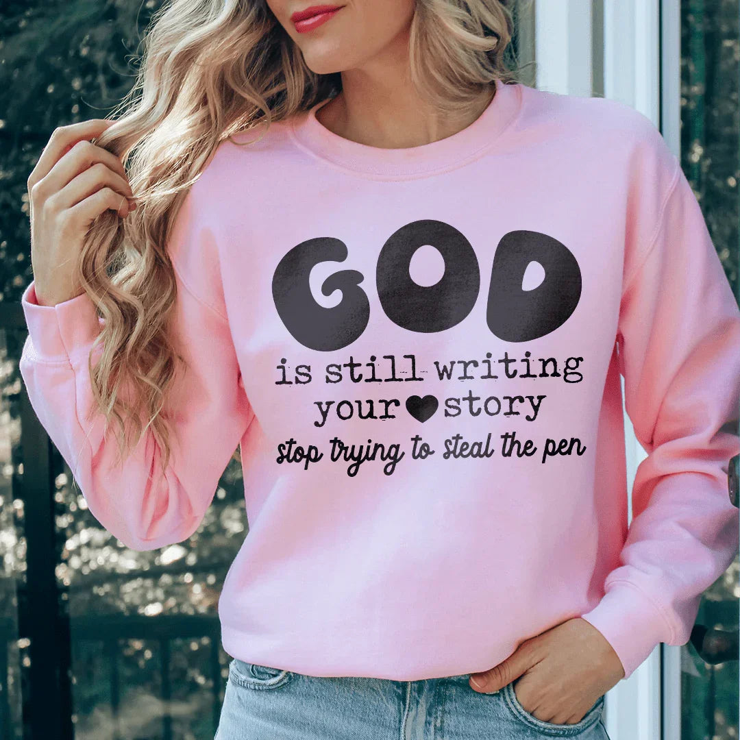 God Is Still Writing Your Story Stop Trying To Steal The Pen Sweatshirt Light Pink / S Peachy Sunday T-Shirt