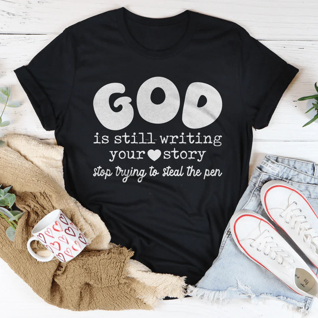 God Is Still Writing Your Story Stop Trying To Steal The Pen Tee Black Heather / S Peachy Sunday T-Shirt