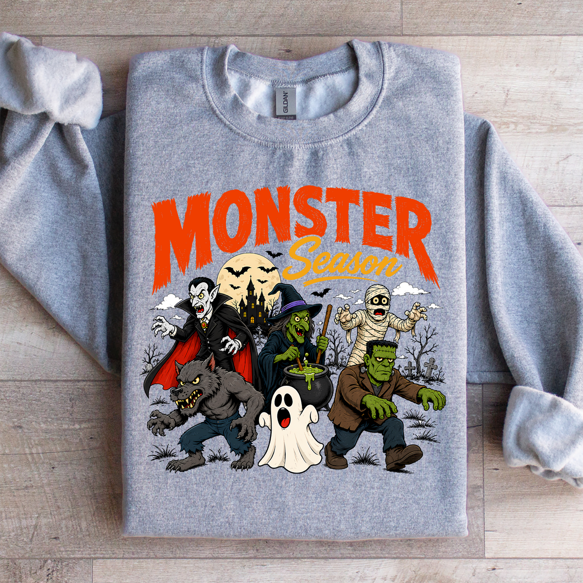 Retro Monster Season Halloween Sweatshirt with Vintage Frankenstein Dracula and Mummy Artwork