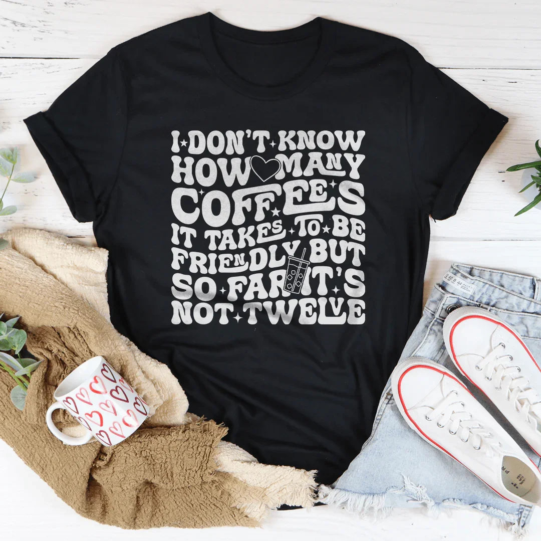 I Don't Know How Many Coffees It Takes To Be Friendly Tee Black Heather / S Peachy Sunday T-Shirt