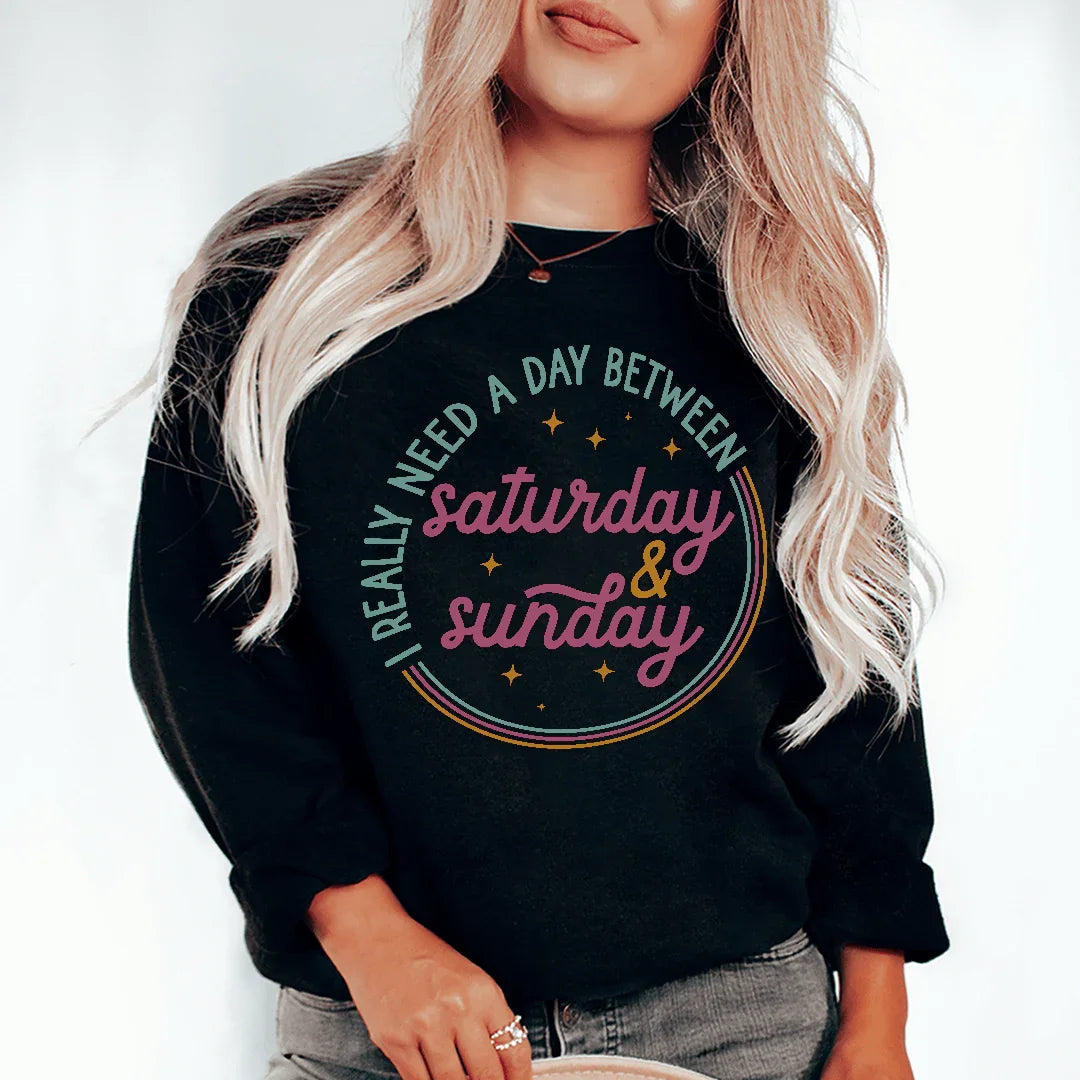 I Really Need A Day Between Saturday Sunday Sweatshirt Black / S Peachy Sunday T-Shirt