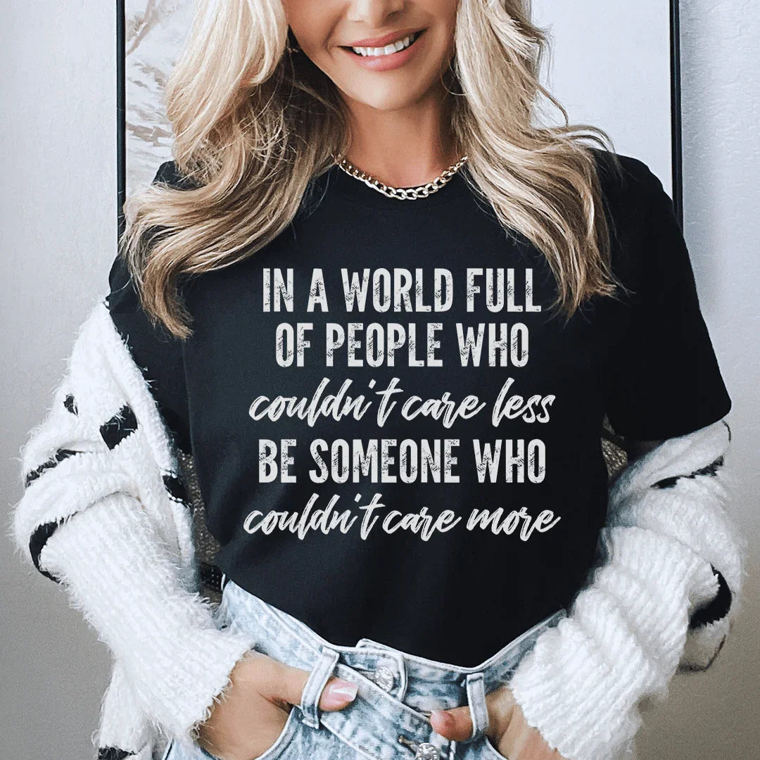 In A World Full Of People Who Couldn't Care Less Be Someone Tee Black / S Peachy Sunday T-Shirt