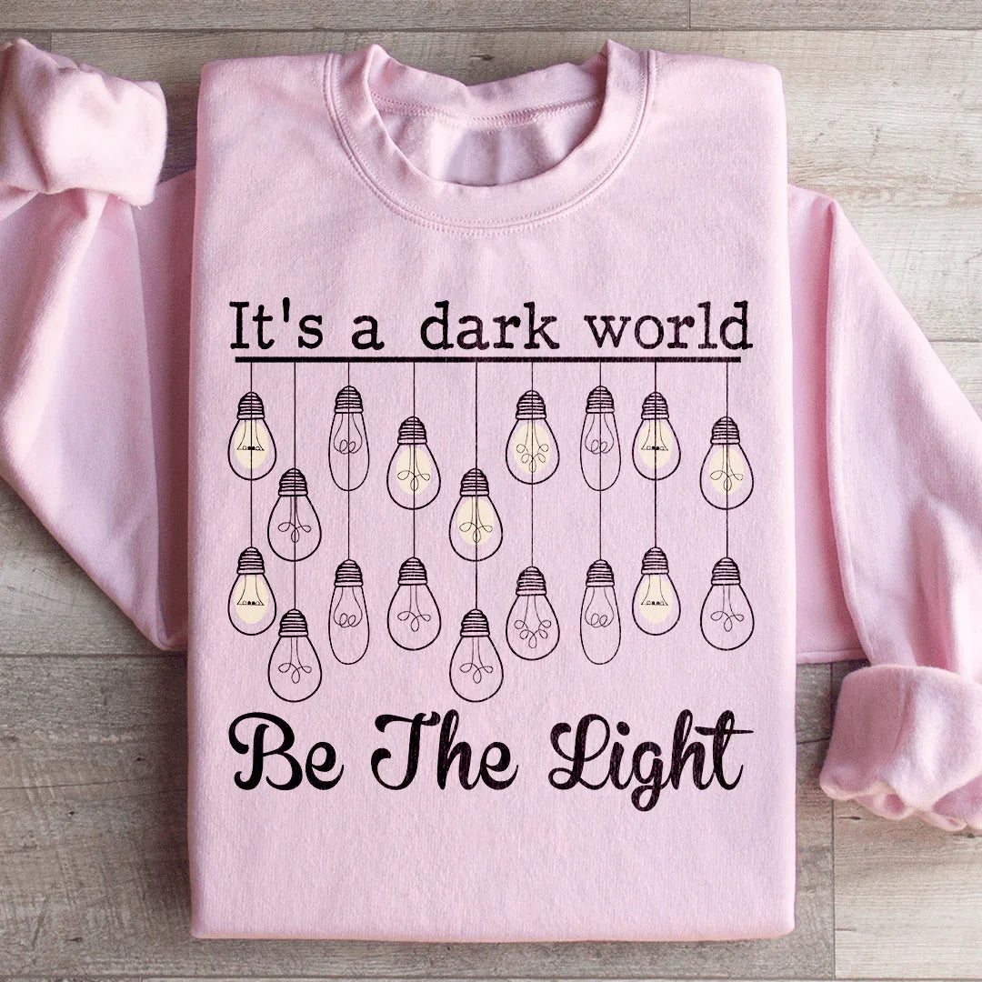 It's A Dark World Be The Light Sweatshirt Light Pink / S Peachy Sunday T-Shirt