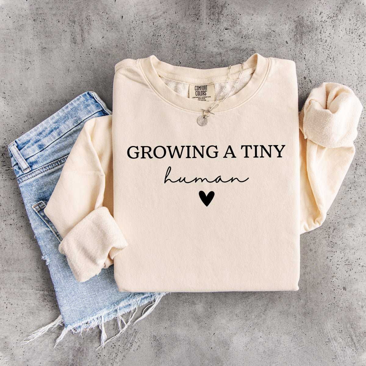 \"Growing A Tiny Human\" Minimalist Maternity Sweatshirt