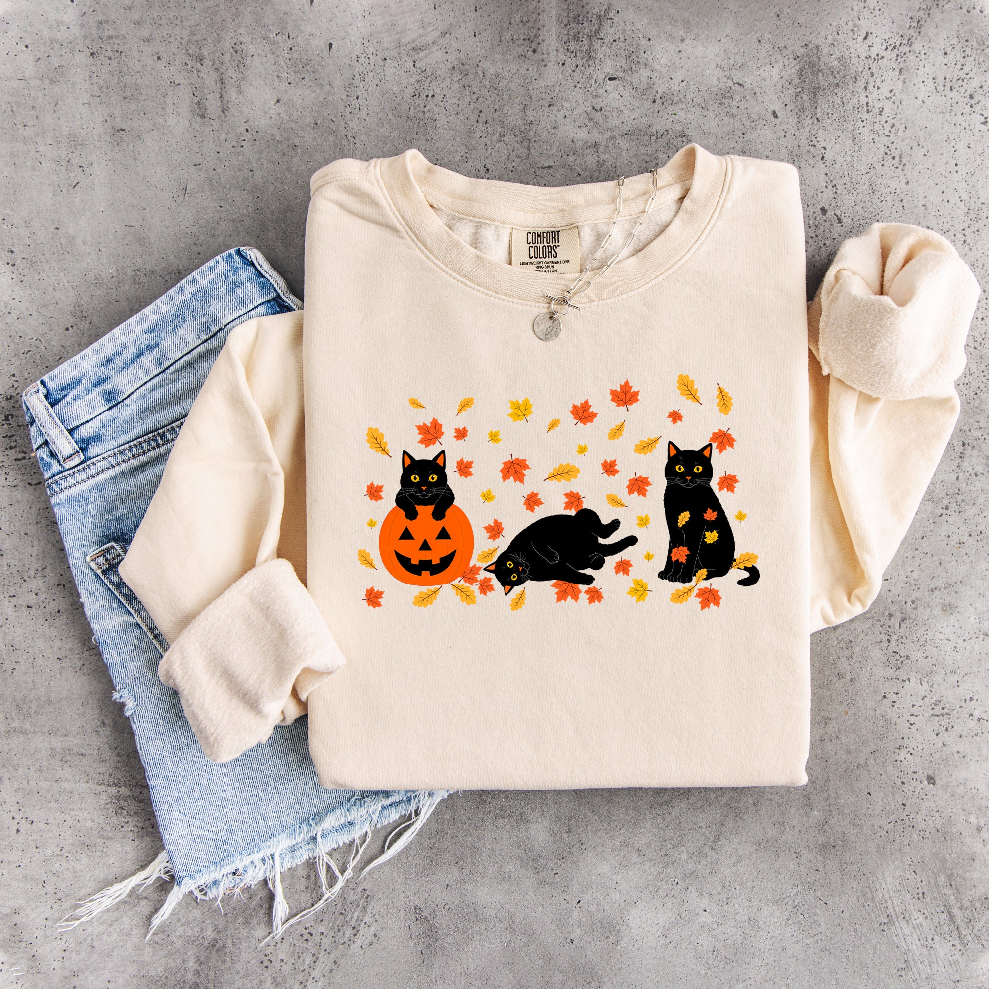 Schwarzes Herbst-Sweatshirt mit schwarzer Katze