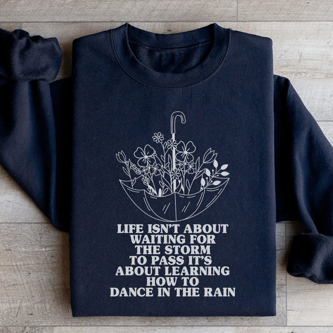 Life Isn't About Waiting For The Storm To Pass Sweatshirt Black / S Peachy Sunday T-Shirt