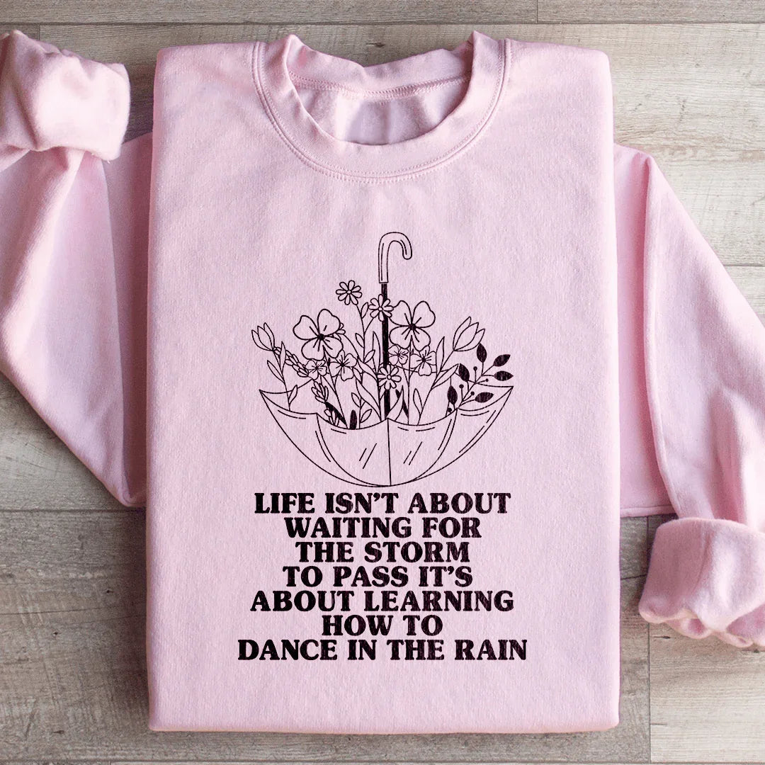 Life Isn't About Waiting For The Storm To Pass Sweatshirt Light Pink / S Peachy Sunday T-Shirt
