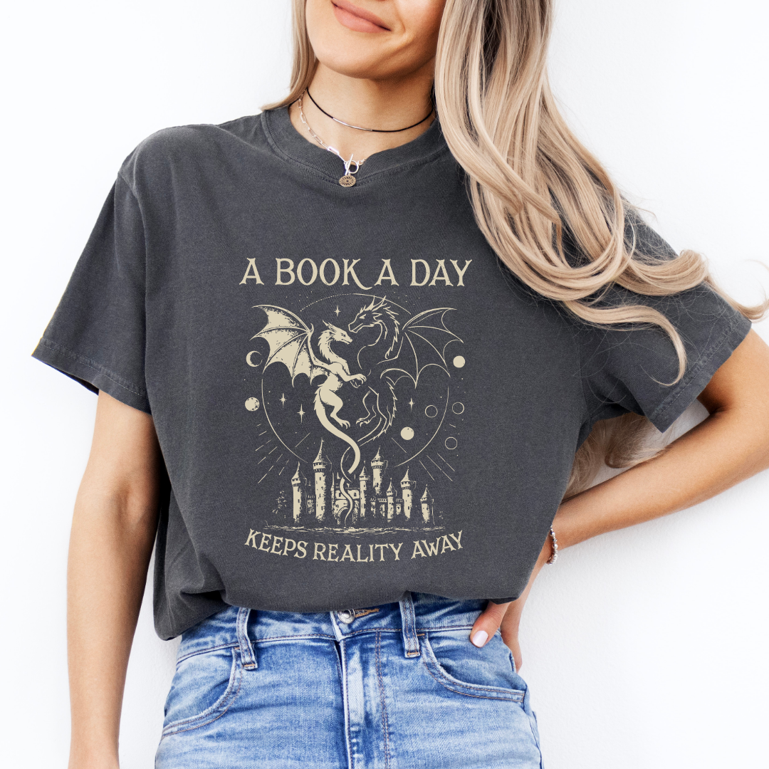 A Book A Day Keeps Reality Away Tee