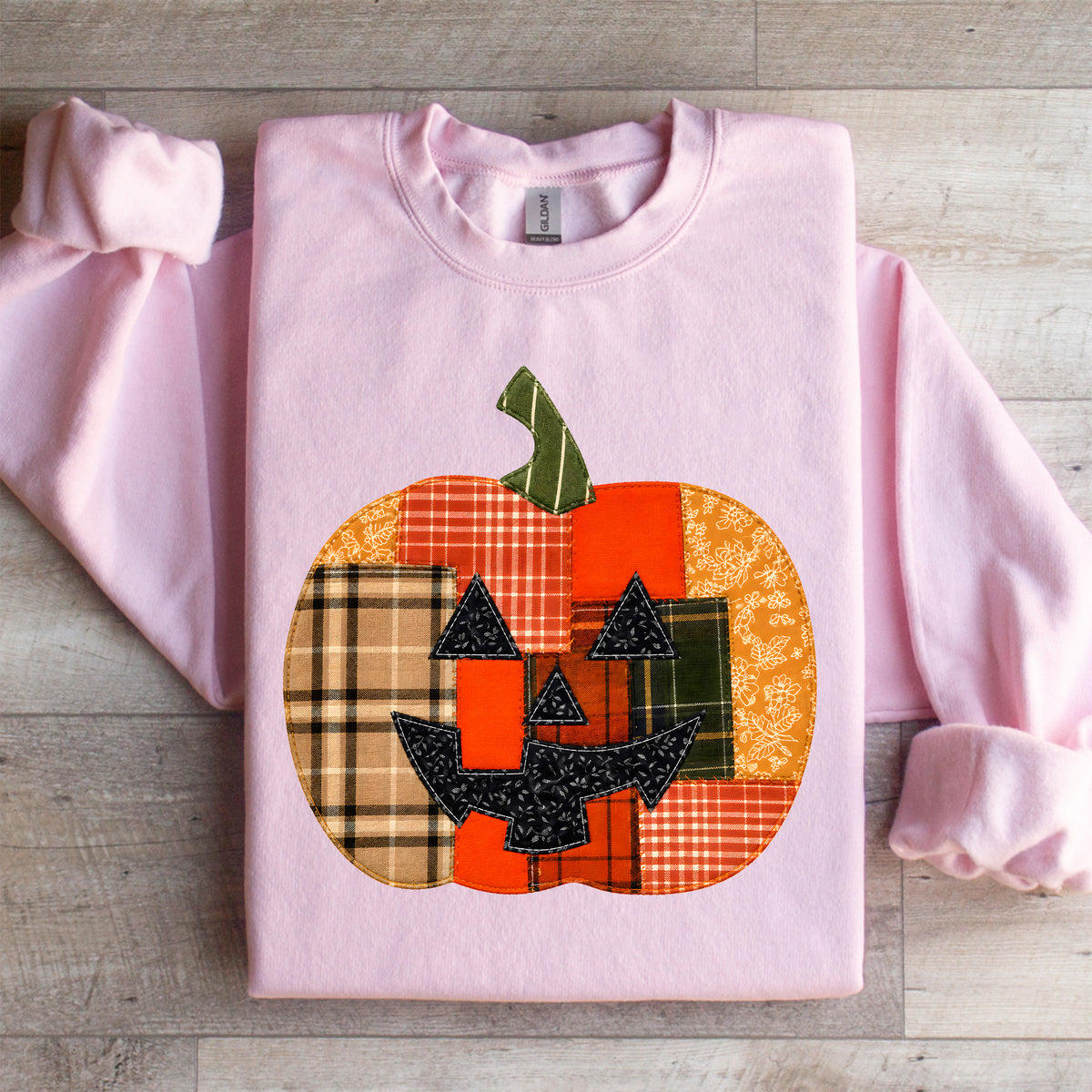 Sudadera con calabaza de retales