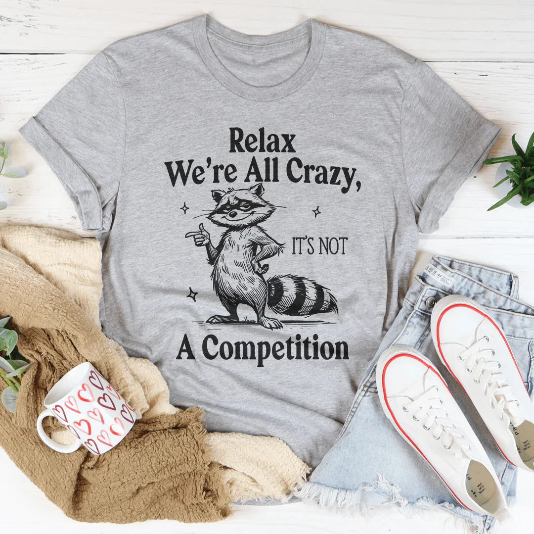 Relax We’re All Crazy It's Not A Competition Tee Athletic Heather / S Peachy Sunday T-Shirt