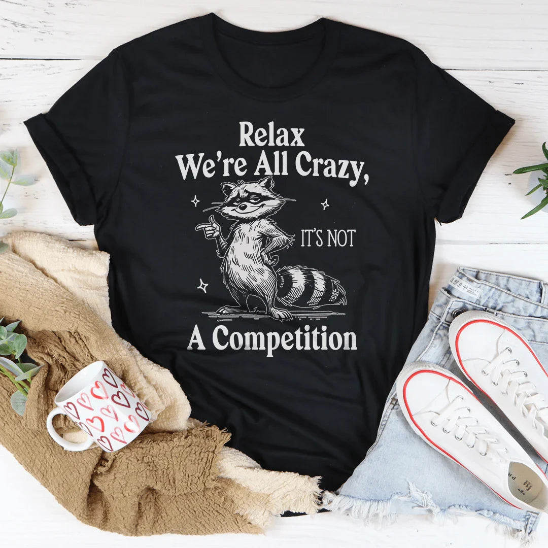 Relax We’re All Crazy It's Not A Competition Tee Black Heather / S Peachy Sunday T-Shirt