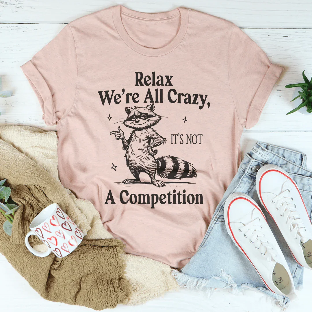 Relax We’re All Crazy It's Not A Competition Tee Heather Prism Peach / S Peachy Sunday T-Shirt