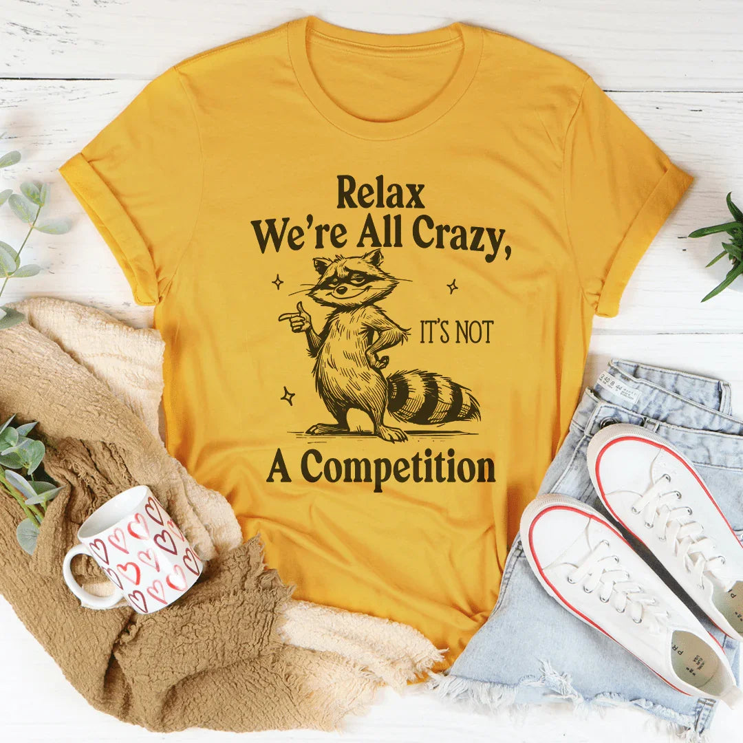 Relax We’re All Crazy It's Not A Competition Tee Mustard / S Peachy Sunday T-Shirt