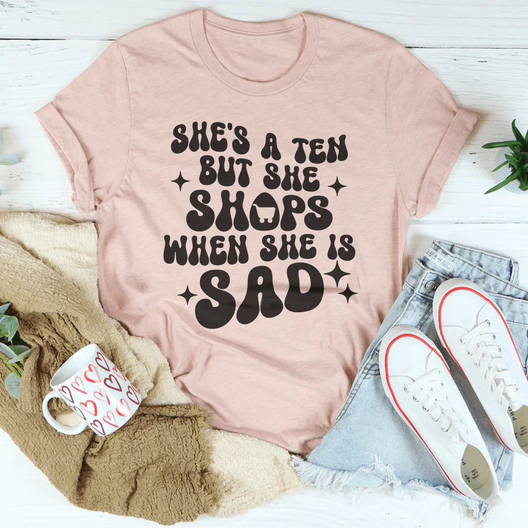 She's A Ten But She Shops When She Is Sad Tee Heather Prism Peach / S Peachy Sunday T-Shirt