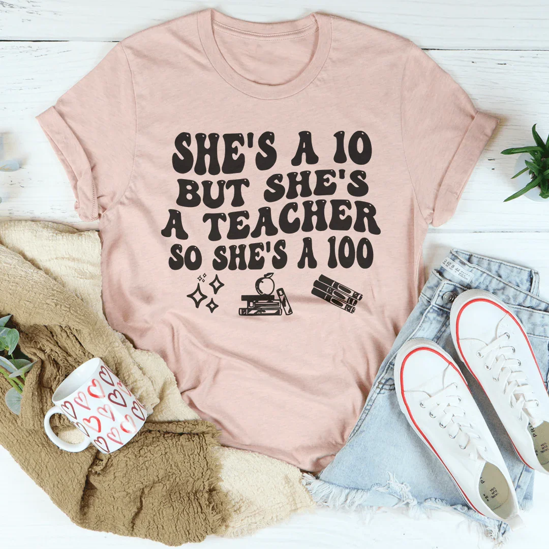 Shes A 10 But She's A Teacher So She's A 100 tee Heather Prism Peach / S Peachy Sunday T-Shirt