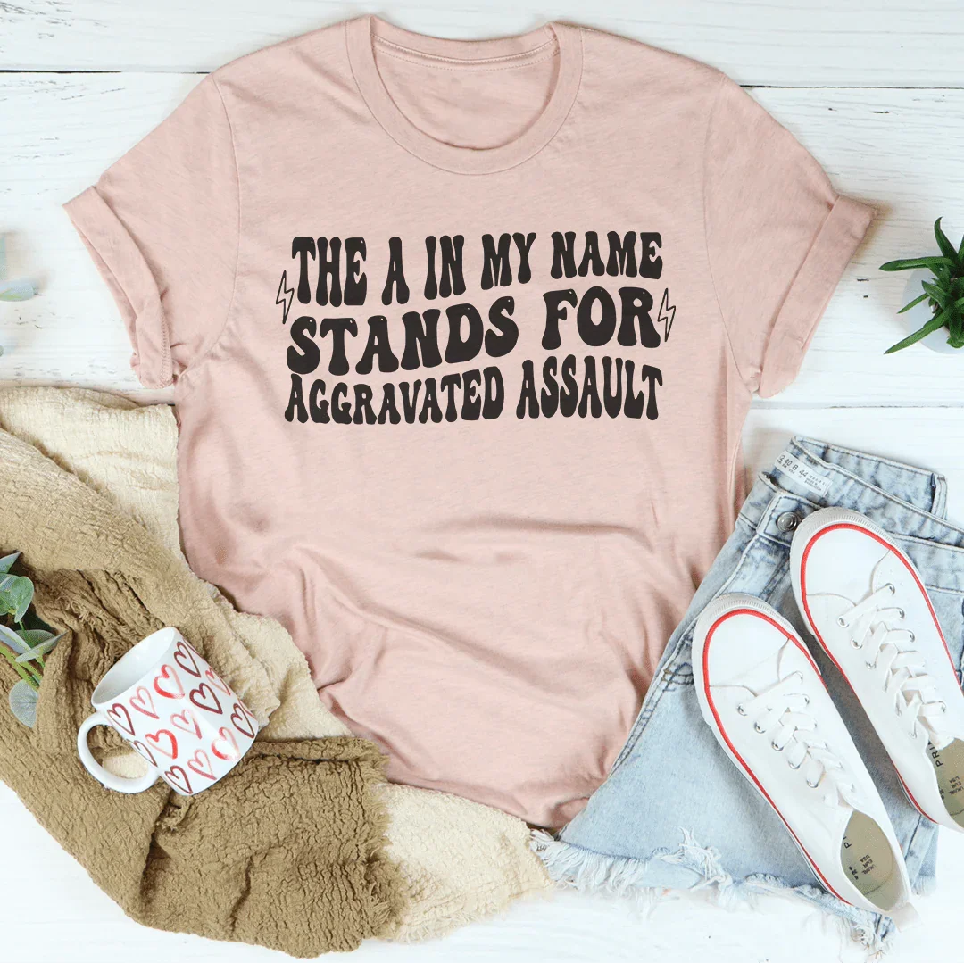 The A In My Name Stands For Aggravated Assault Tee Heather Prism Peach / S Peachy Sunday T-Shirt