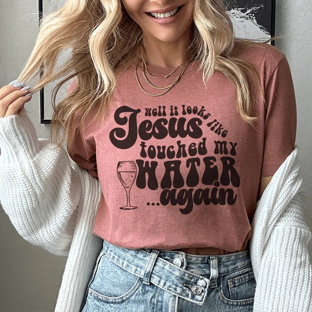 Well It Looks Like Jesus Touched My Water Again Tee Mauve / S Peachy Sunday T-Shirt
