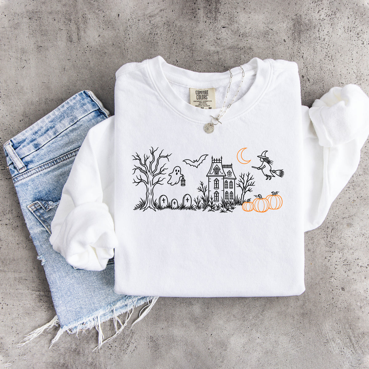 Sweat-shirt brodé « Manoir hanté »