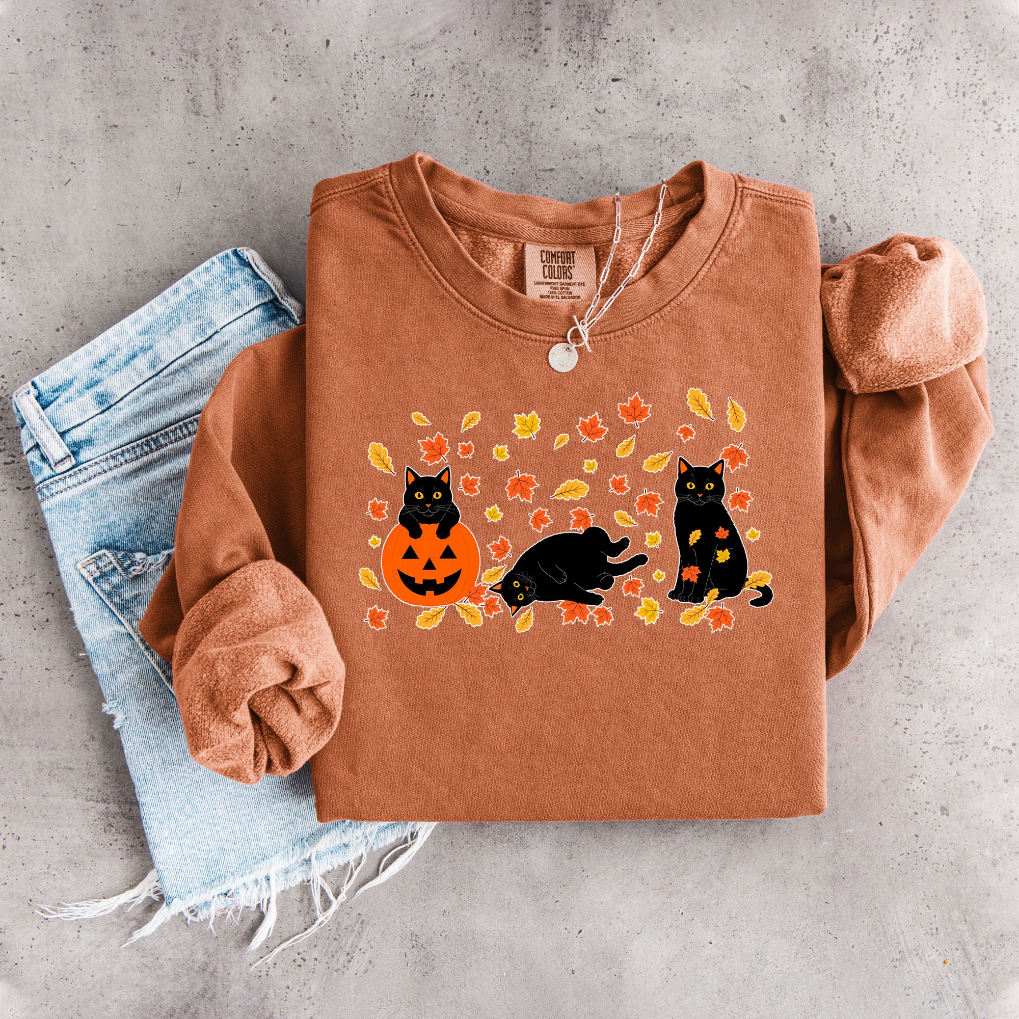 Schwarzes Herbst-Sweatshirt mit schwarzer Katze