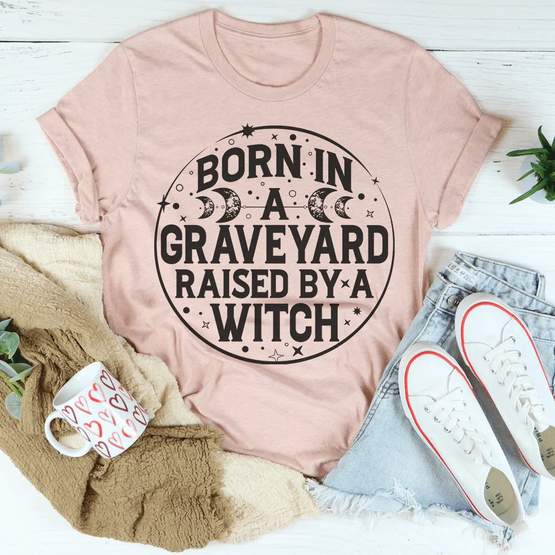 Born In A Graveyard Raised By A Witch Tee Peachy Sunday T-Shirt