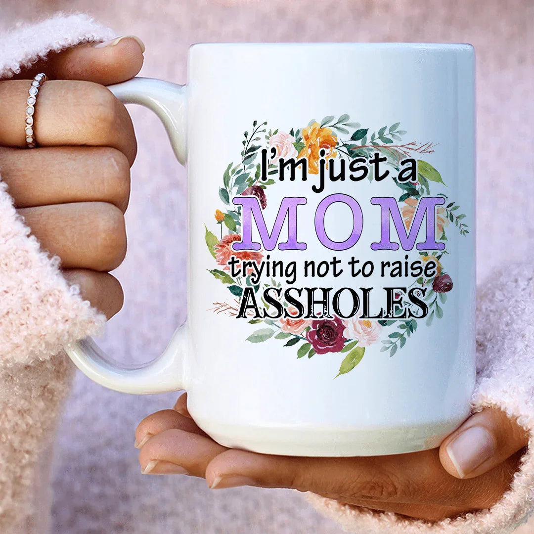 I'm Just A Mom Trying Not To Raise Assholes Ceramic Mug 15 oz White / One Size CustomCat Drinkware T-Shirt