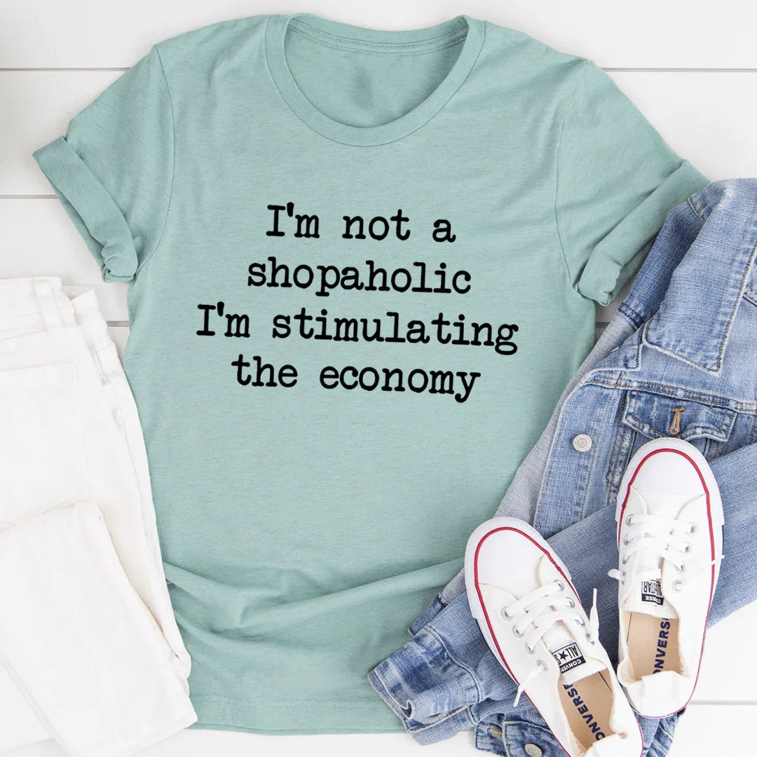 I'm Not A Shopaholic I'm Stimulating The Economy Tee Heather Prism Dusty Blue / S Peachy Sunday T-Shirt