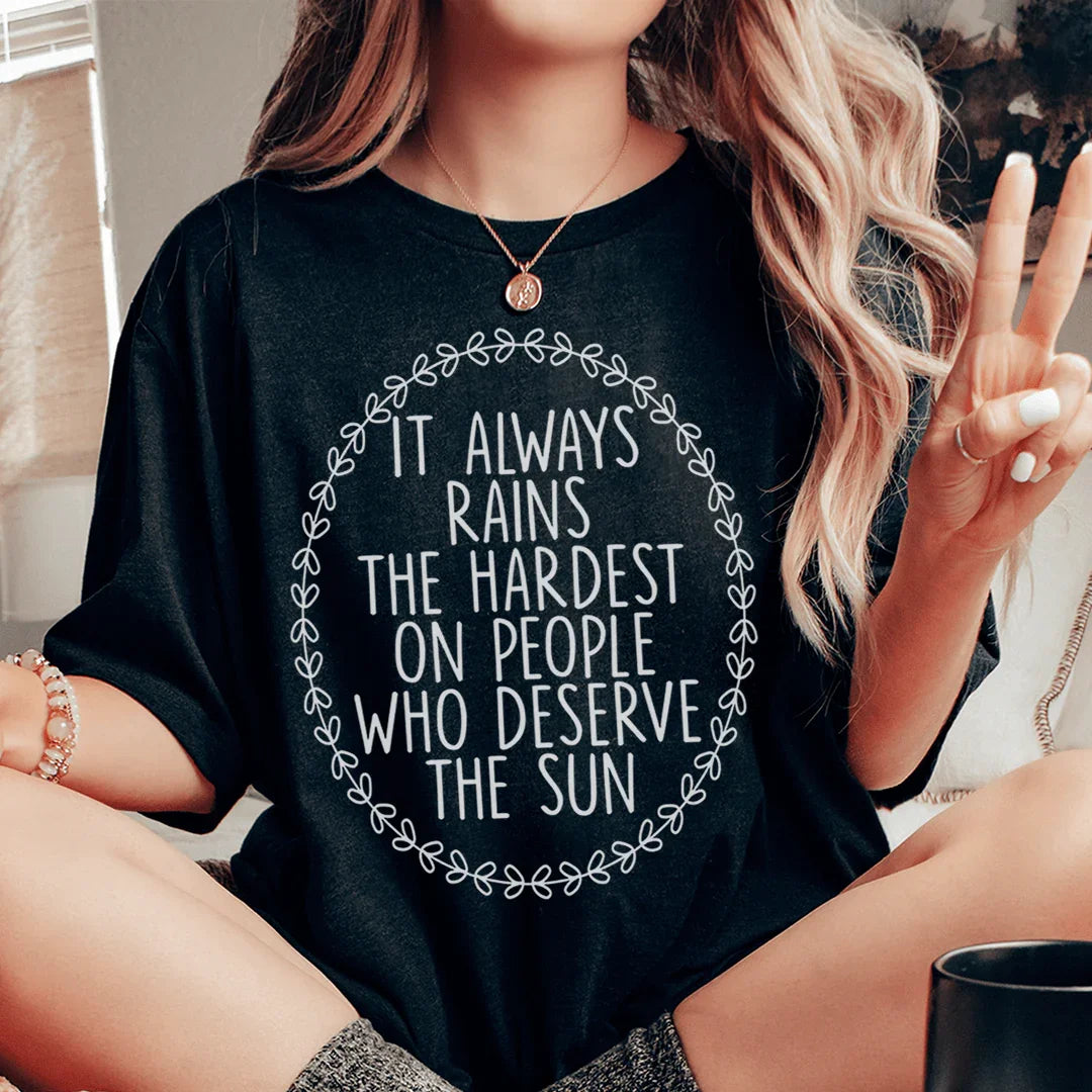 It Always Rains The Hardest On People Who Deserve The Sun Tee Black Heather / S Peachy Sunday T-Shirt