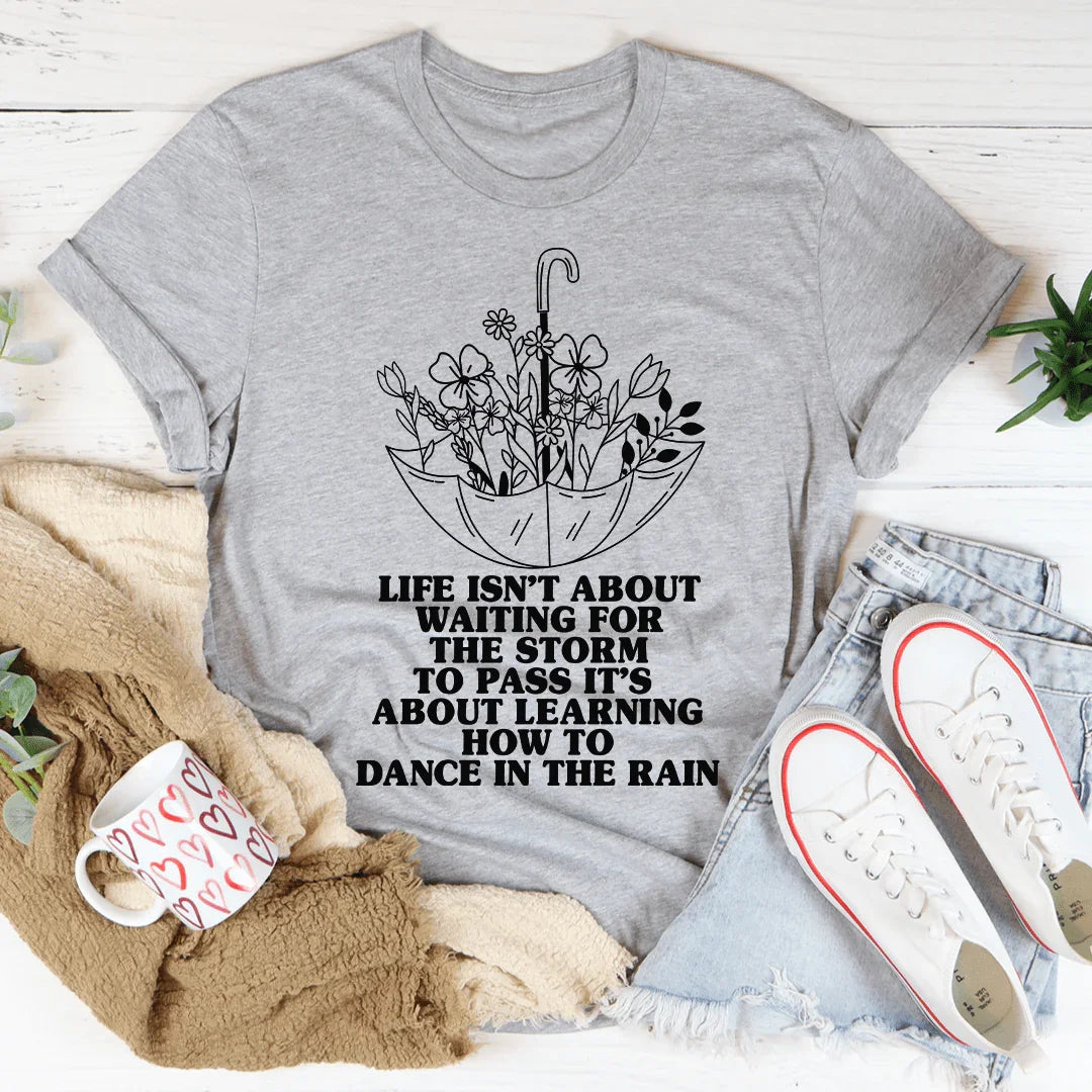 Life Isn't About Waiting For The Storm To Pass Tee Peachy Sunday T-Shirt