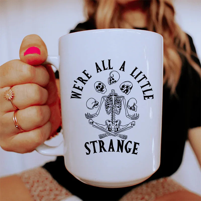 We're All A Little Strange Ceramic Mug 15 oz White / One Size CustomCat Drinkware T-Shirt