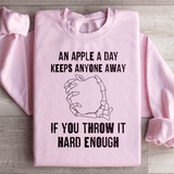 An Apple A Day Keeps Anyone Away If You Throw It Hard Enough Sweatshirt Light Pink / S Peachy Sunday T-Shirt
