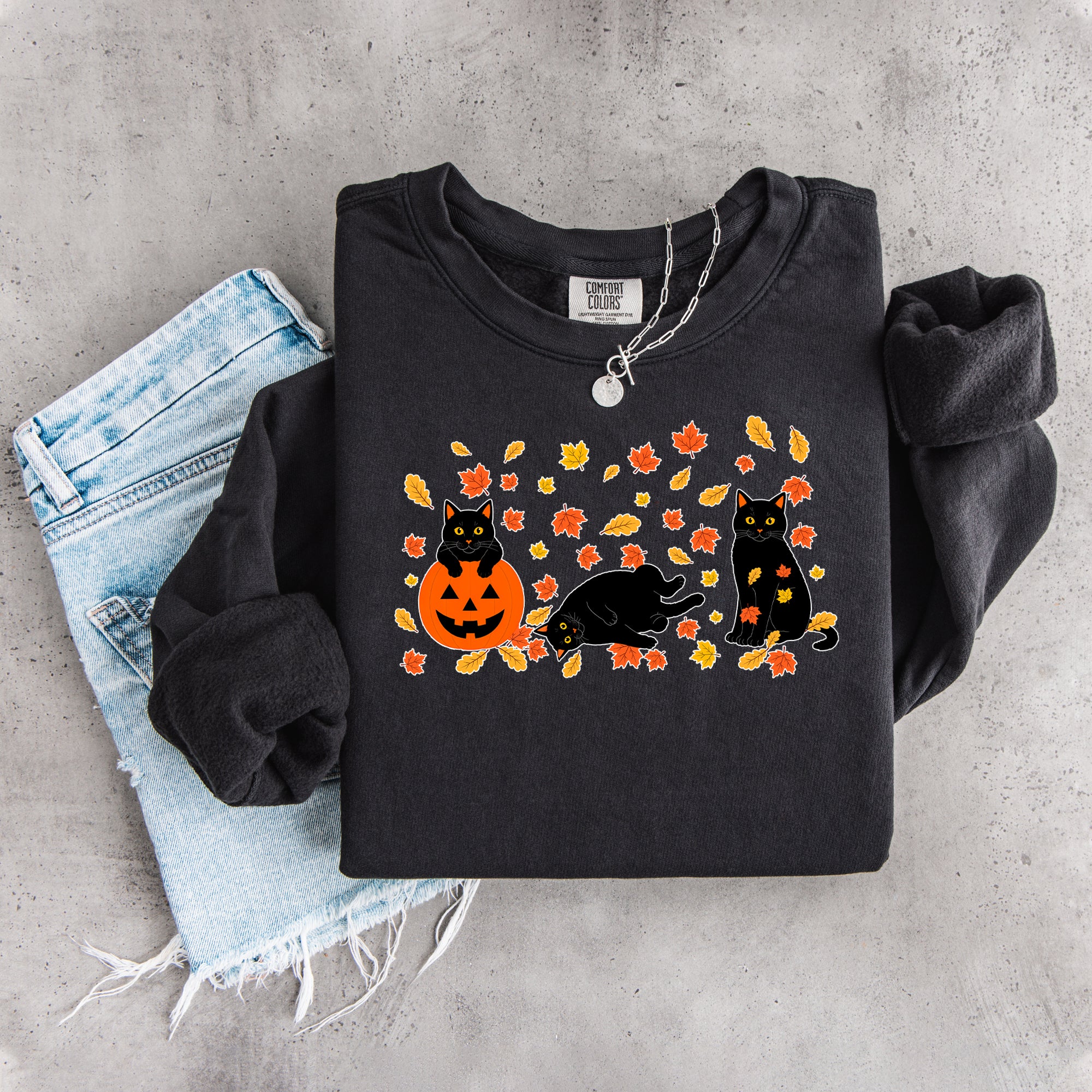 Schwarzes Herbst-Sweatshirt mit schwarzer Katze