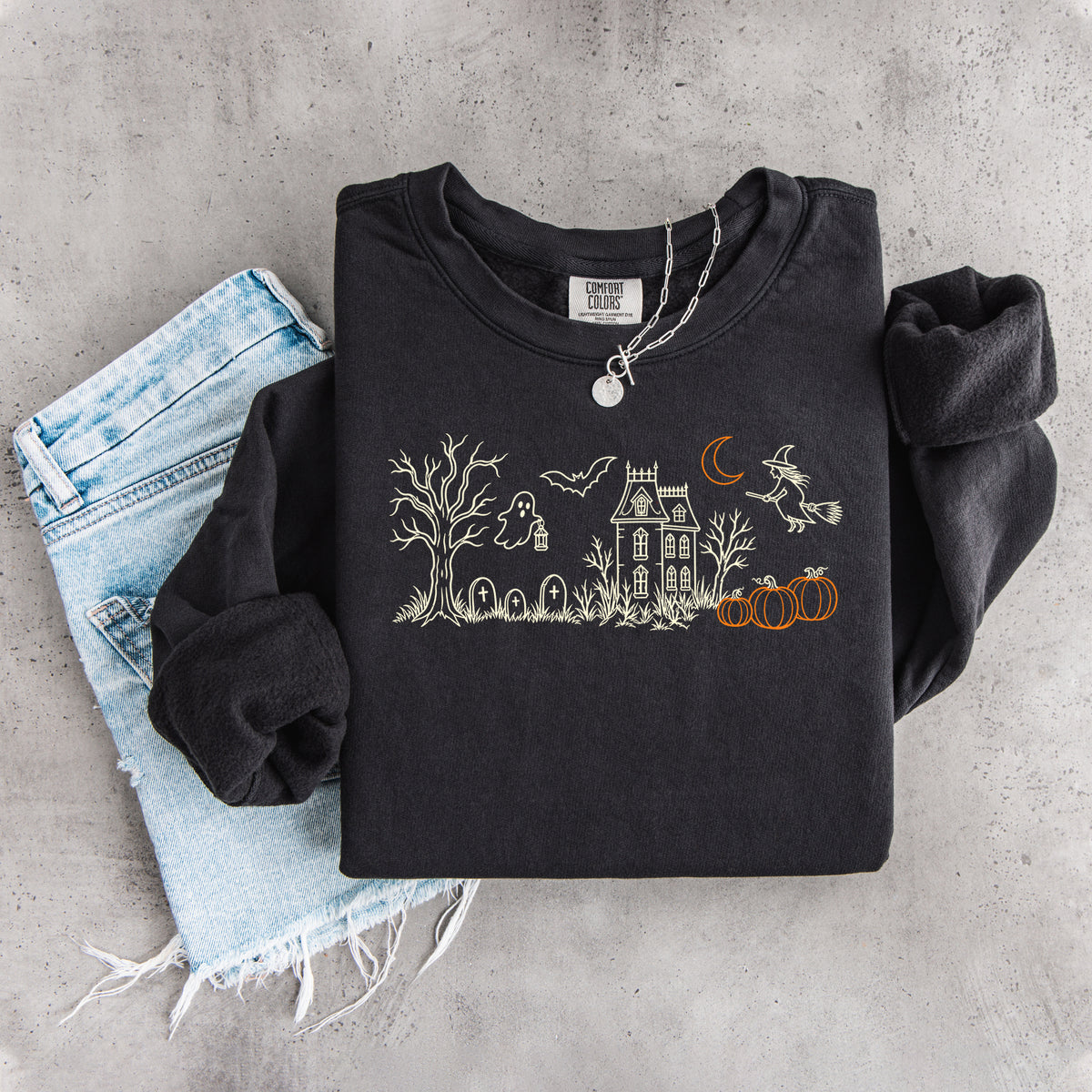 Sweat-shirt brodé « Manoir hanté »