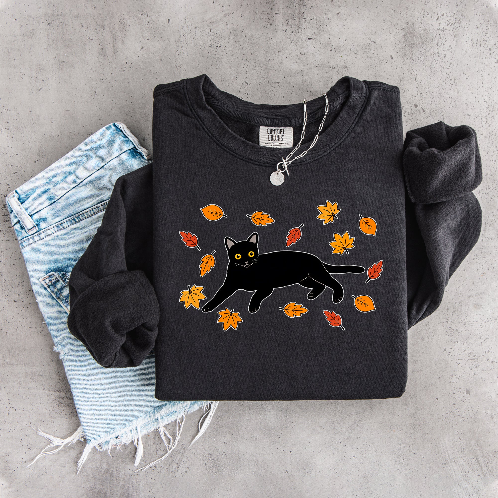 Sudadera otoñal de gato negro