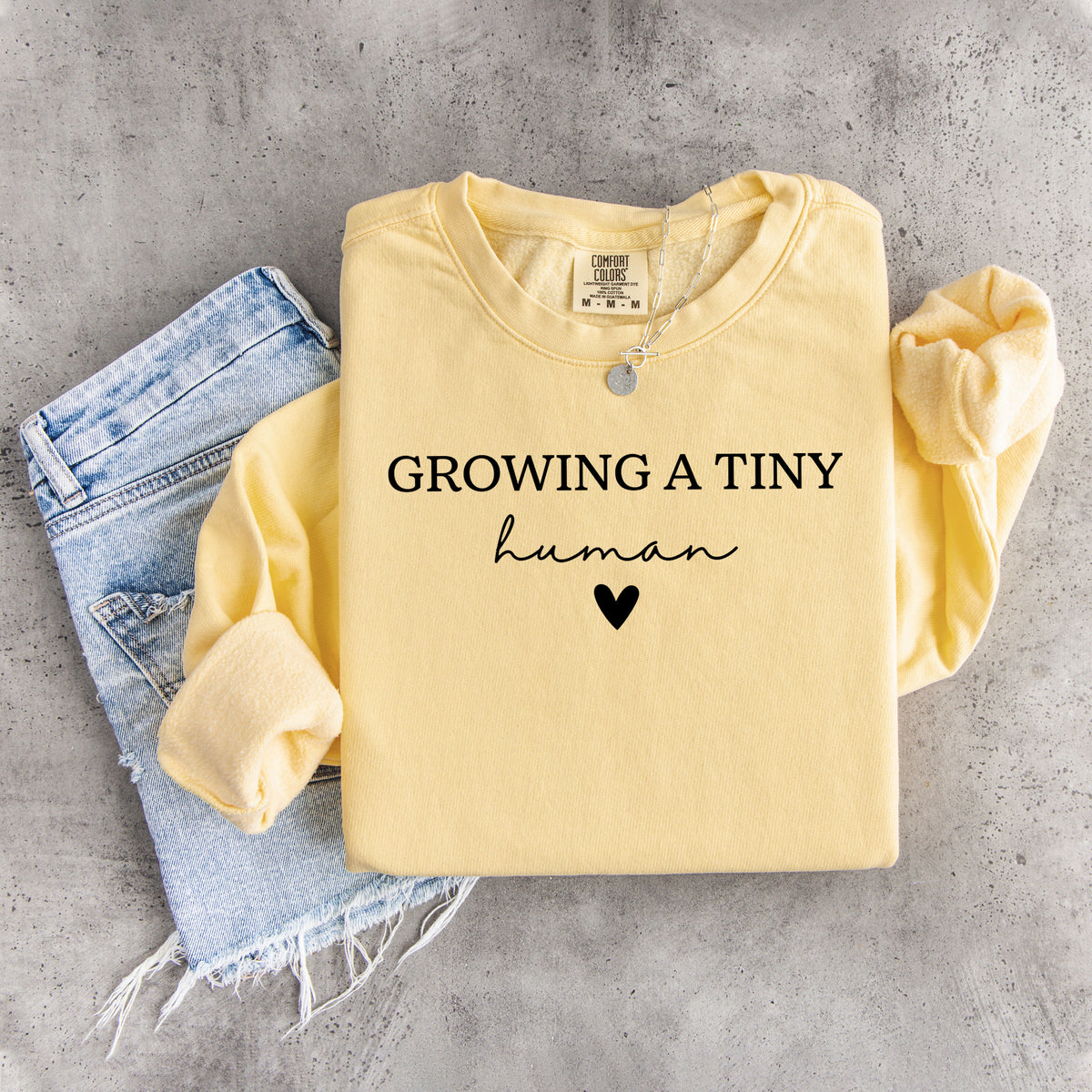 \"Growing A Tiny Human\" Minimalist Maternity Sweatshirt
