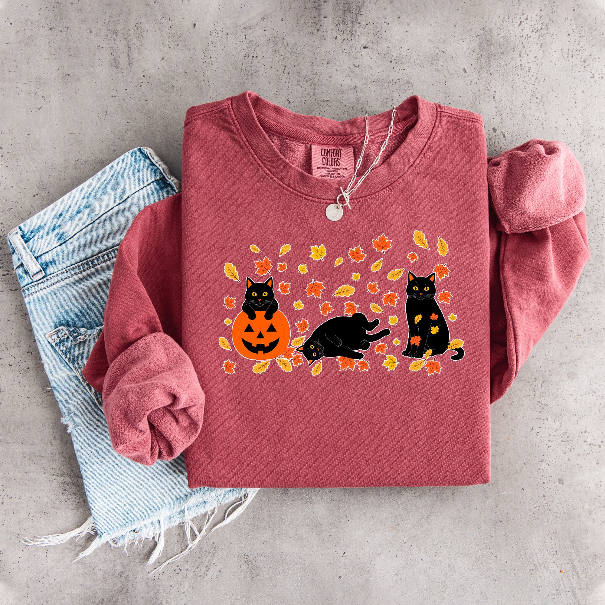 Schwarzes Herbst-Sweatshirt mit schwarzer Katze