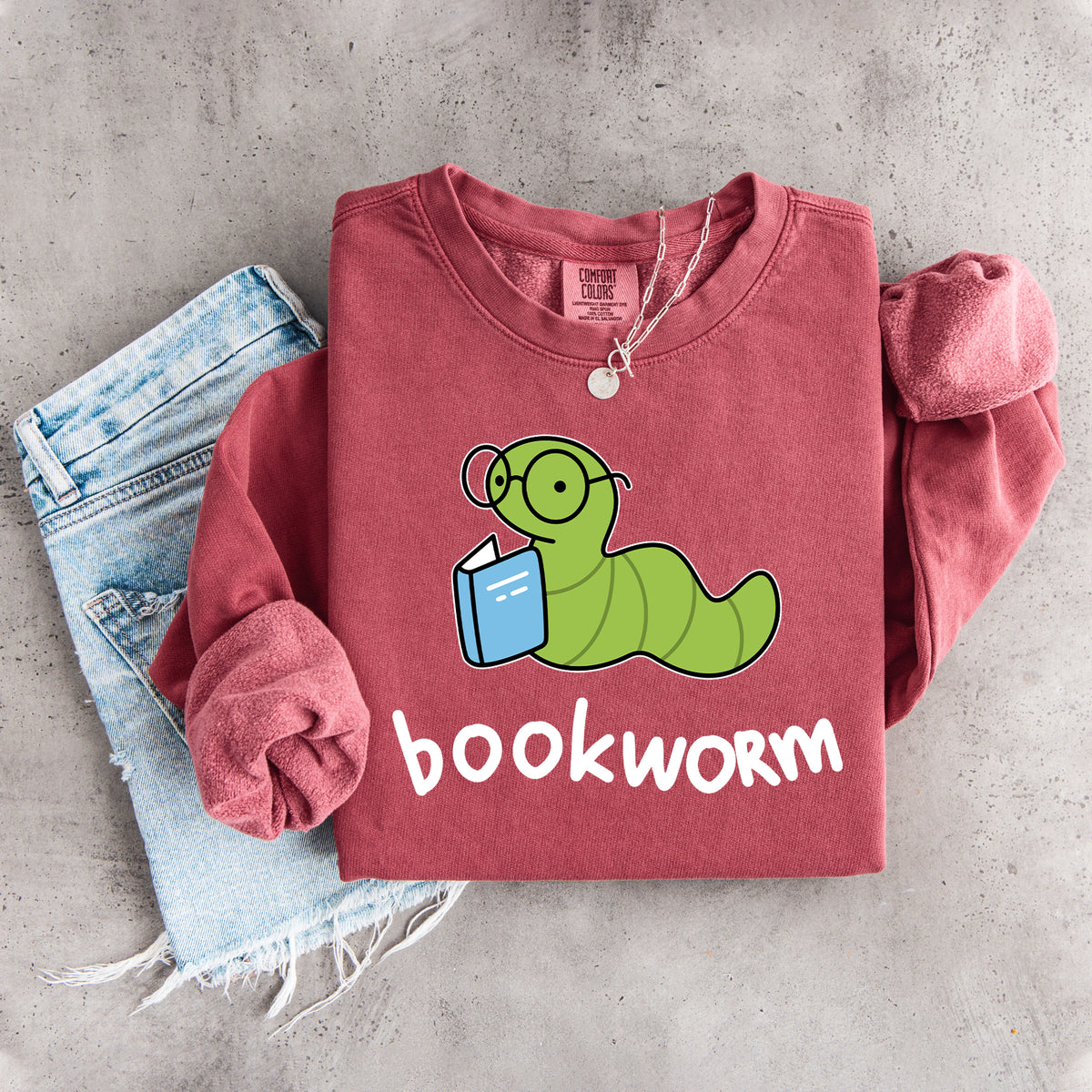 „Bookworm“ – niedliches Sweatshirt mit lesender Raupe als Motiv
