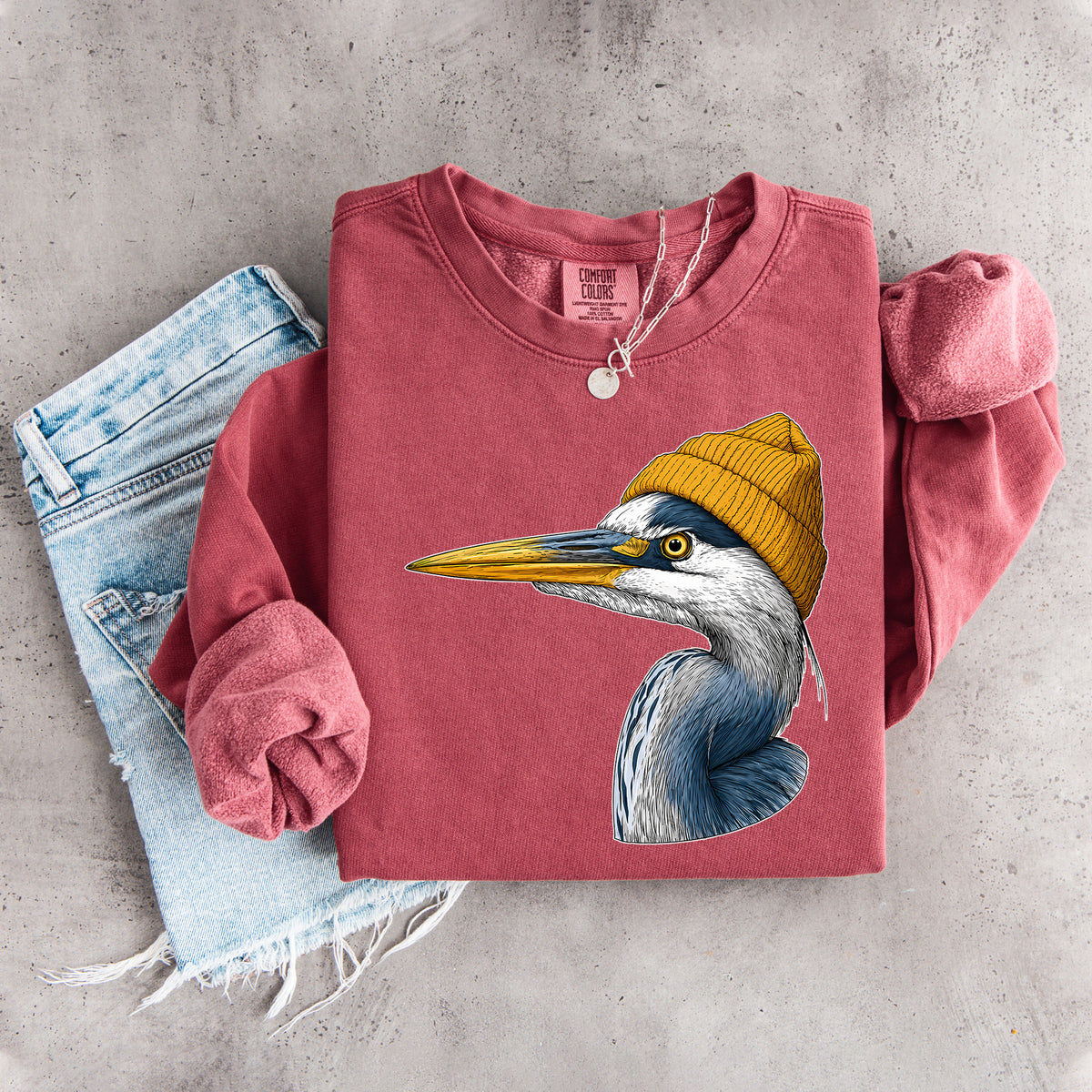 Great Blue Heron Wearing Knit Beanie Wildlife Art Crewneck Sweatshirt in Crimson