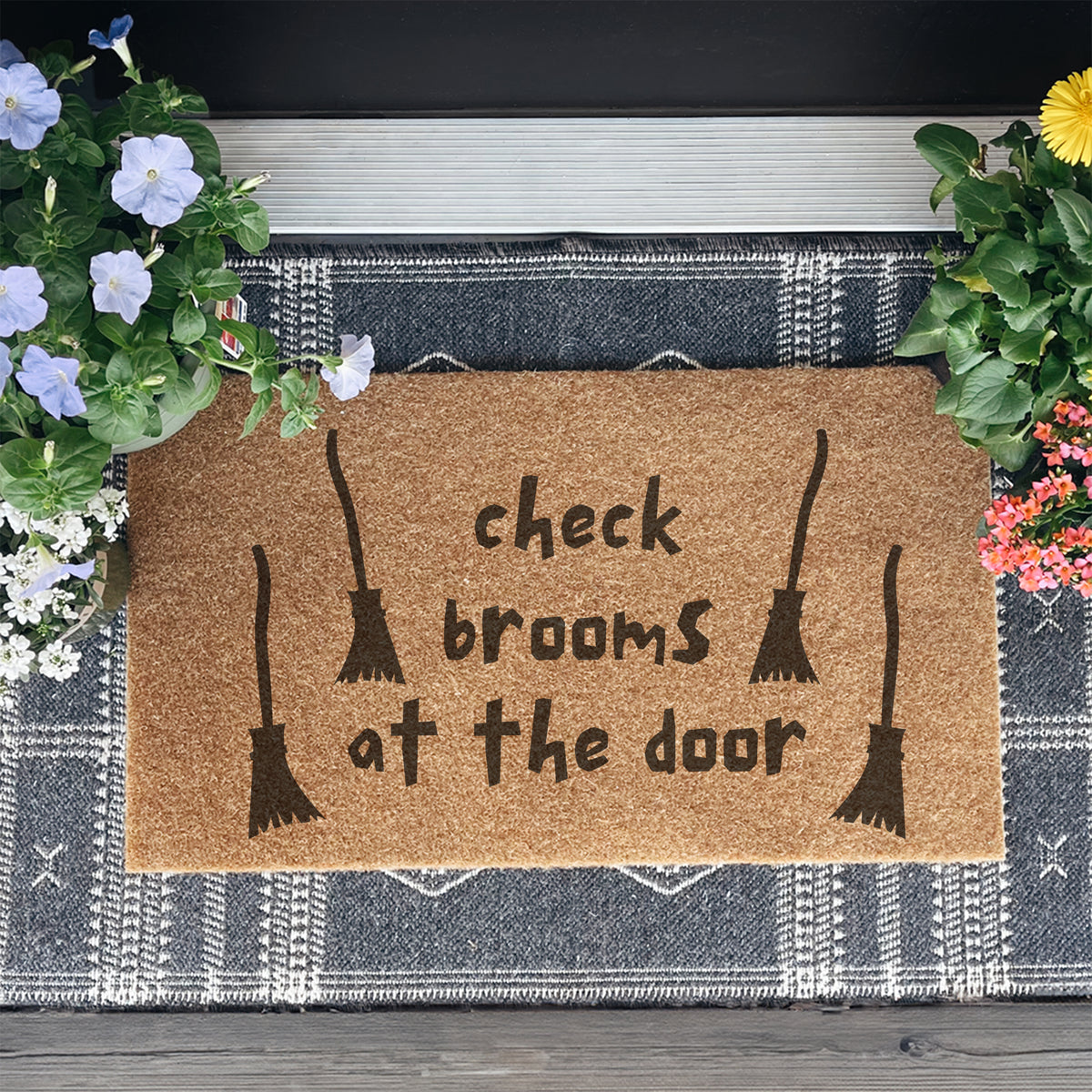 check brooms at the door Doormat