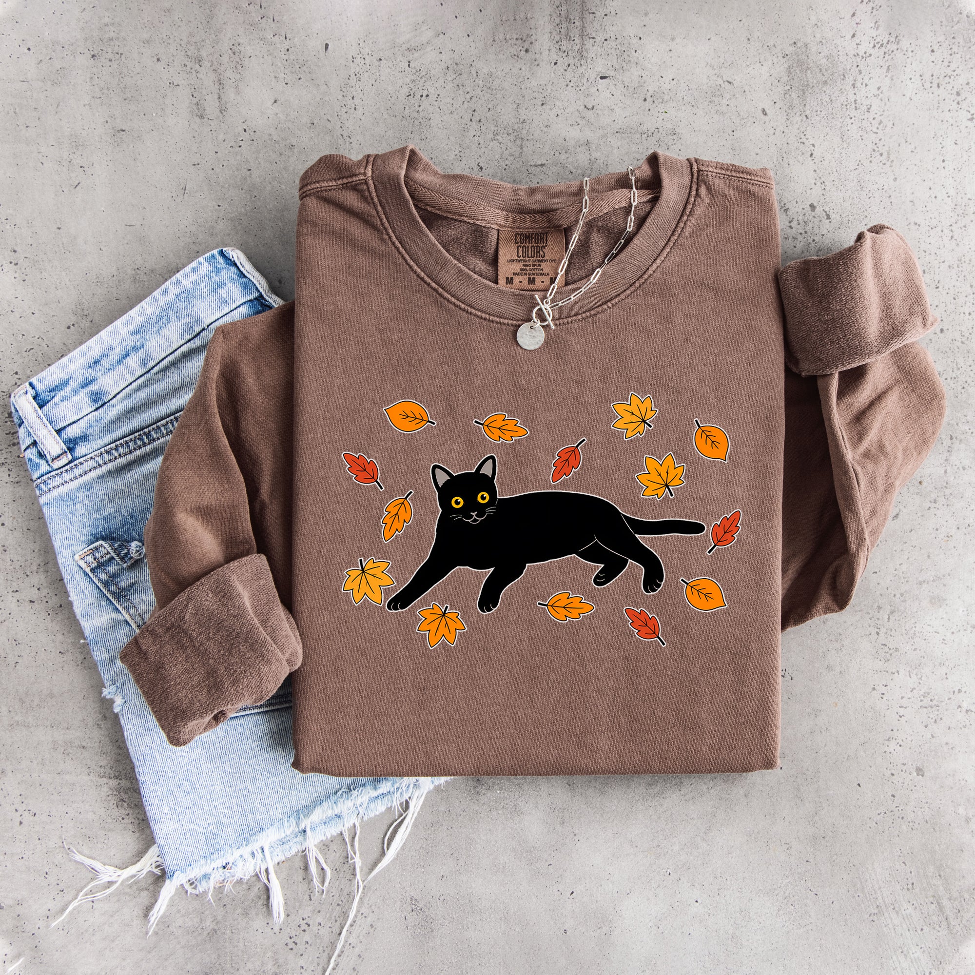 Sudadera otoñal de gato negro