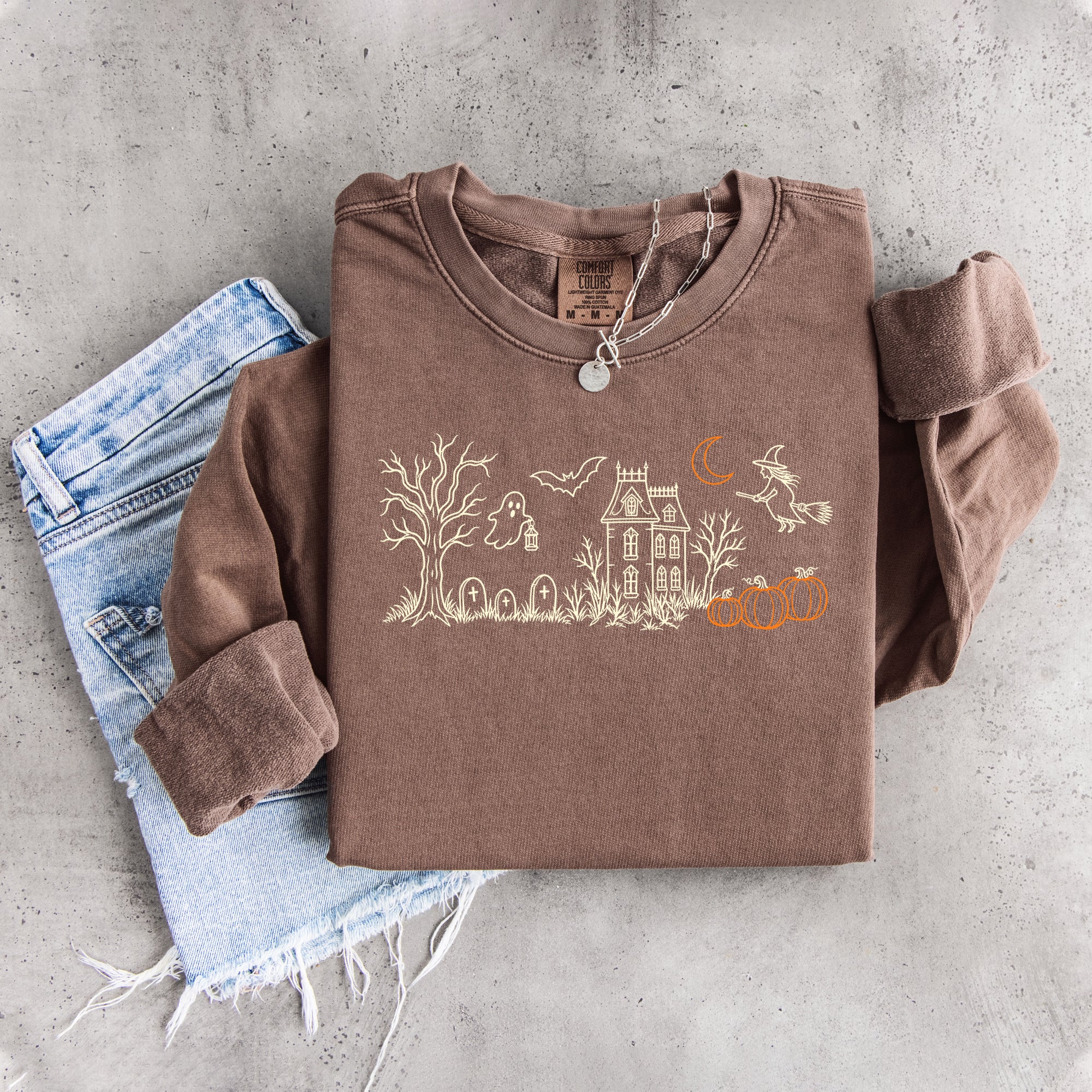 Sweat-shirt brodé « Manoir hanté »