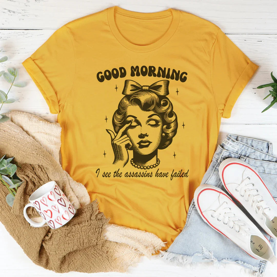 Good Morning I See The Assassins Have Failed Tee Mustard / S Peachy Sunday T-Shirt
