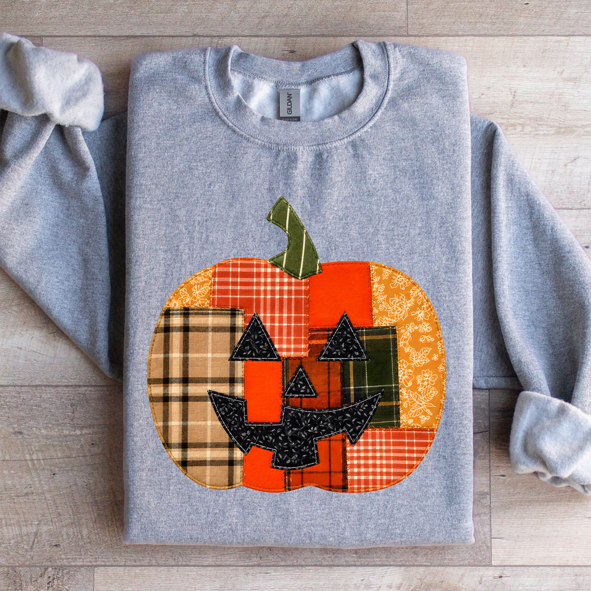 Sudadera con calabaza de retales